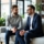 Flux_Dev_Two_professional_men_talking_on_a_modern_couch_in_a_b_1
